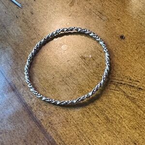 Elegant Sterling Silver Twisted Bangle